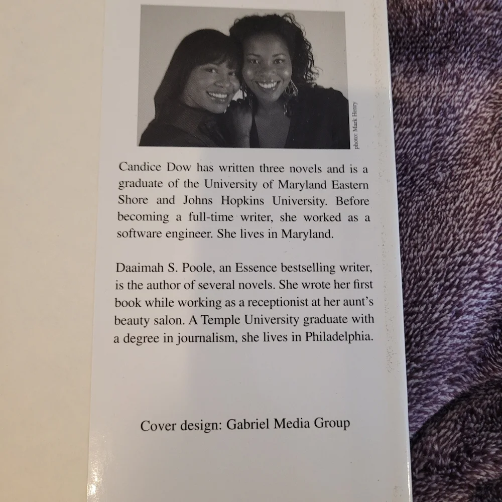 Fictional book: We Take This Man. Arthors: Candice Dow & Daaimah S. Poole.